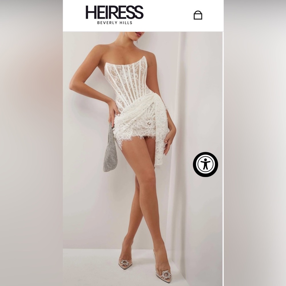 White lace corset mini dress 
Size Large
New with tags, never been worn